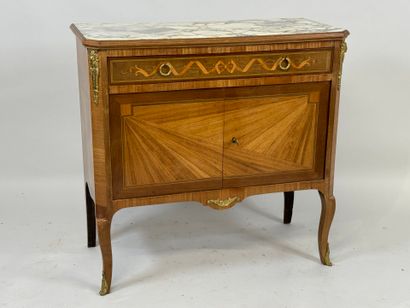 Small inlaid commode opening with two doors...