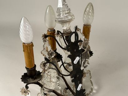 Bronze three-arm sconce with crystal pendants.
H....