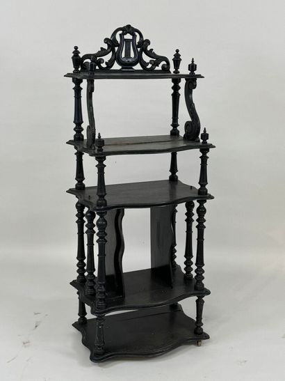 Blackened, openwork and turned wood music...
