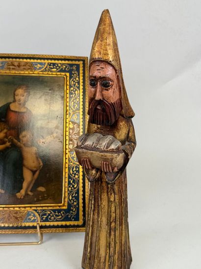 Lot comprenant deux sujets en bois figurant...