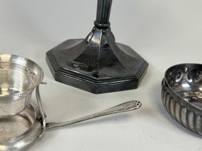 An octagonal bowl on a silver-plated metal...