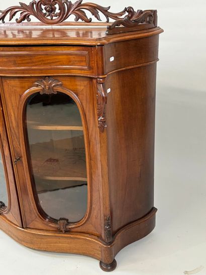 Small curved wooden display cabinet opening...