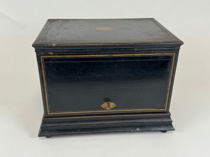 Liqueur cellar in blackened wood and brass...