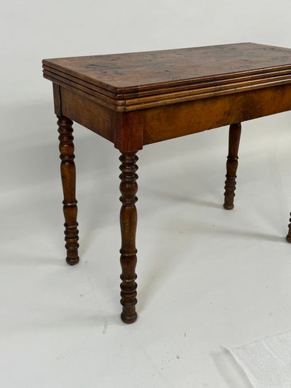 Turned wood game table with green fabric...