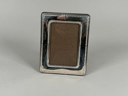 Cadre porte-photo en argent 900 mil., le...