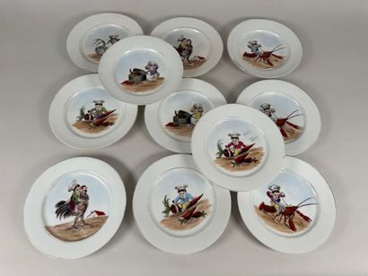 Série de onze assiettes en porcelaine à décor...