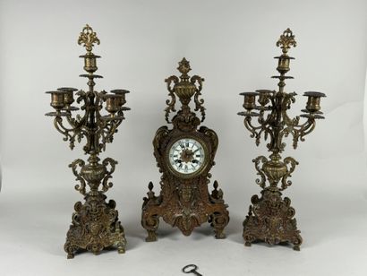 Garniture de cheminée en bronze ciselé à...