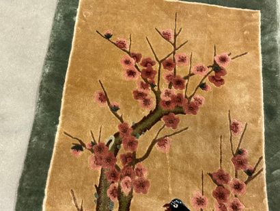 Small silk carpet with polychrome decoration...