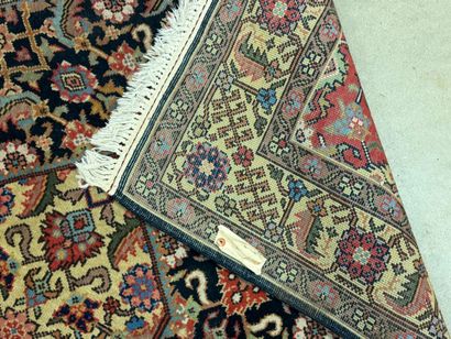 Oriental rug in knotted wool decorated with...