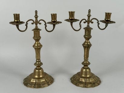 Pair of bronze torches with two arms, the...