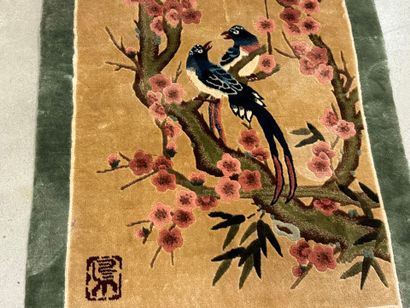 Small silk carpet with polychrome decoration...