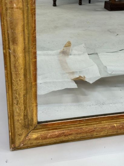 Wood and gilded stucco mirror, the upper...