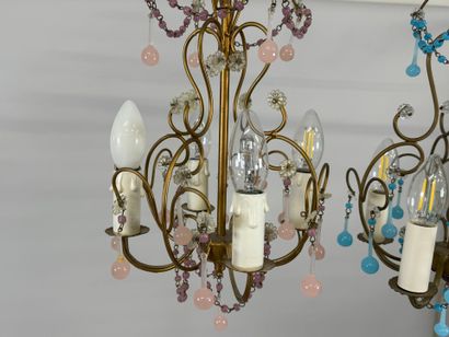 Two gilded metal chandeliers with blue and...