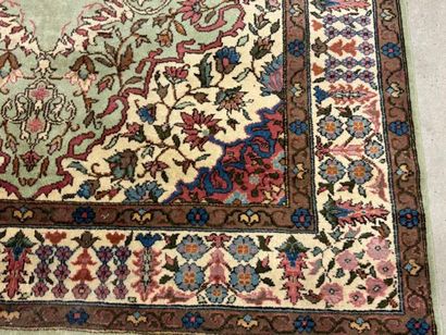 Oriental hand-knotted wool rug decorated...