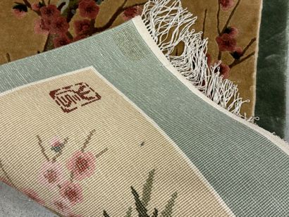 Small silk carpet with polychrome decoration...