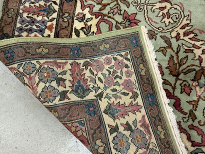 Oriental hand-knotted wool rug decorated...