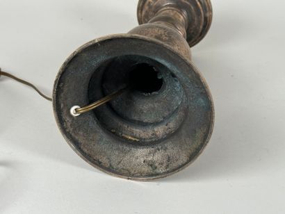 Metal candlestick, circular base.
Mounted...