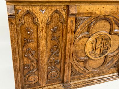 Church chest in molded and carved oak decorated...