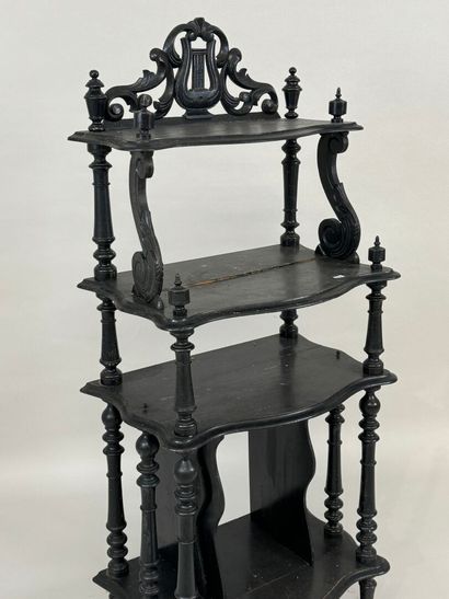 Blackened, openwork and turned wood music...