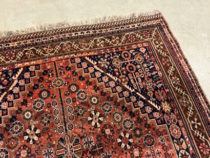 Oriental hand-knotted wool rug with stylized...