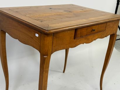 Cherry wood writing table opening with one...