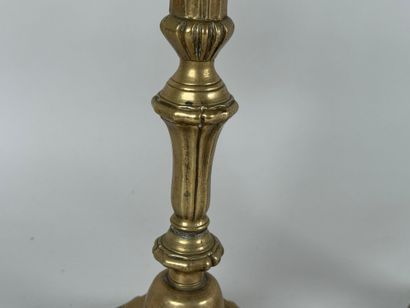 Pair of bronze torches with two arms, the...