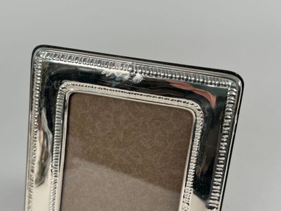 Cadre porte-photo en argent 900 mil., le...