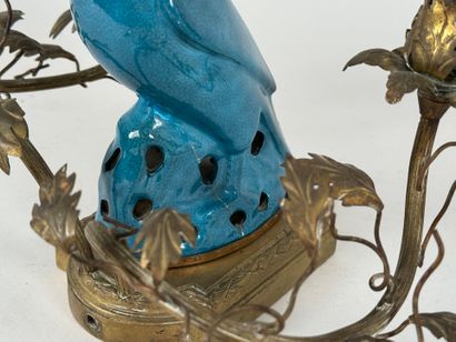 Bronze wall sconce with two light arms, decorated...