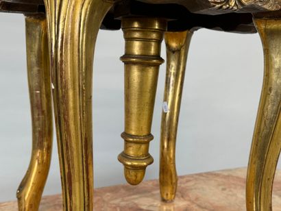 Molded, carved and gilded wood piano stool.
19th...