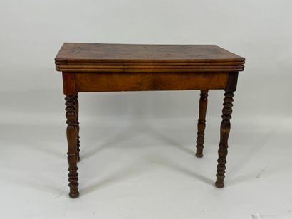 Turned wood game table with green fabric...