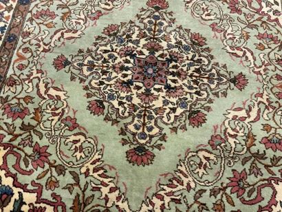 Oriental hand-knotted wool rug decorated...
