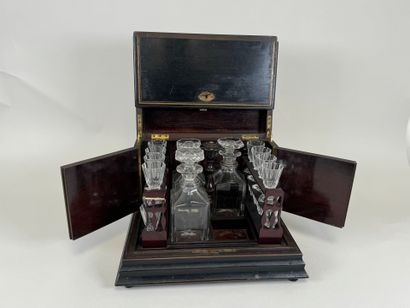 Liqueur cellar in blackened wood and brass...