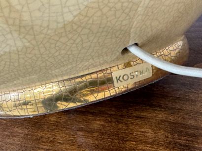 KOSTKA.
Crackled ceramic lamp on yellow ground...