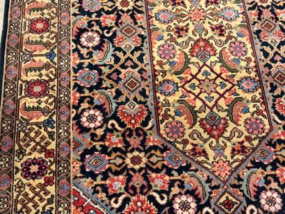 Oriental rug in knotted wool decorated with...