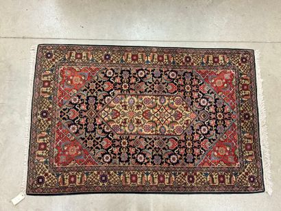 Oriental rug in knotted wool decorated with...