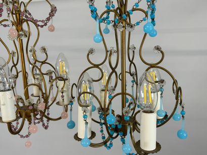 Two gilded metal chandeliers with blue and...