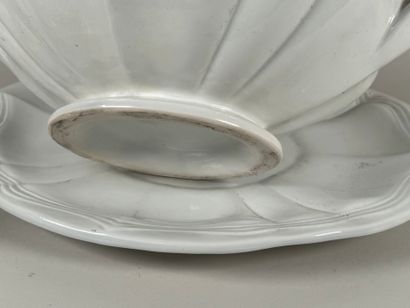 Large white ceramic soup tureen and display...
