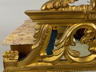 Gilded wood mirror with foliate decoration,...