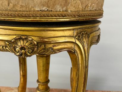 Molded, carved and gilded wood piano stool.
19th...