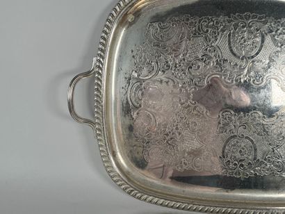 Deux plateaux en métal argenté à décor de...