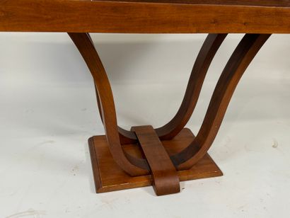 Small wooden dining table with basin base.
74...