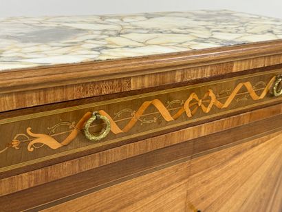 Small inlaid commode opening with two doors...