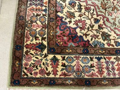 Oriental hand-knotted wool rug decorated...