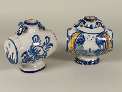 Two polychrome ceramic pourers marked 