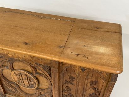 Church chest in molded and carved oak decorated...
