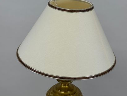 LOB.
Oil lamp in repoussé brass, mounted...