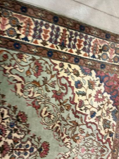 Oriental hand-knotted wool rug decorated...