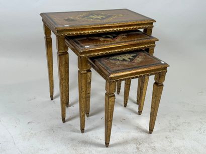 Series of three gilded wood nesting tables,...