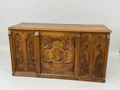 Church chest in molded and carved oak decorated...