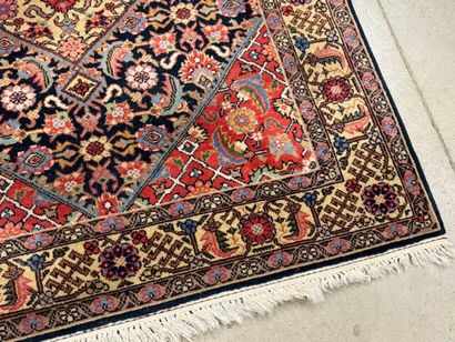 Oriental rug in knotted wool decorated with...